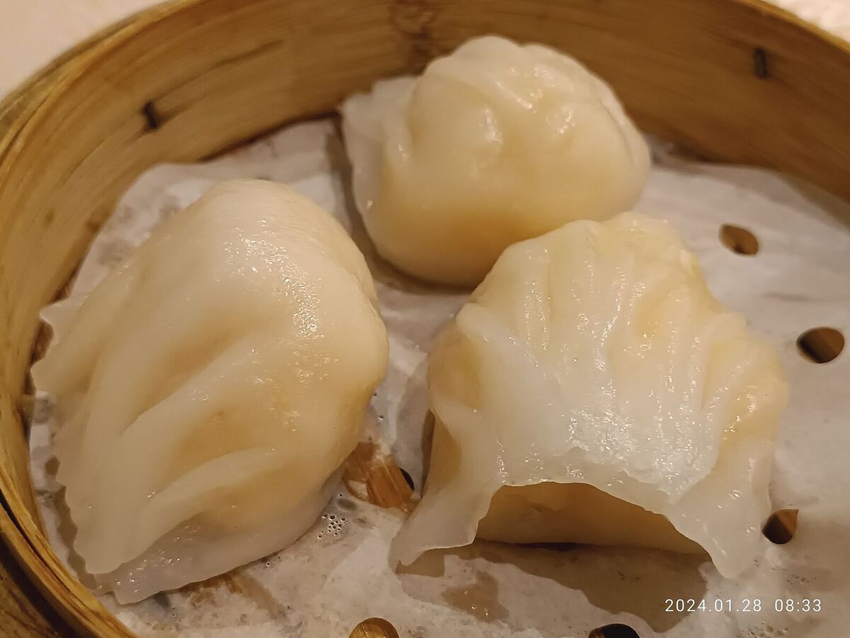 Illustrative photo of shrimp dumplings in a bamboo steamer