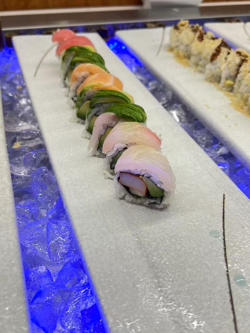 Fish- and avocado-topped sushi rolls at Kyushu Buffet